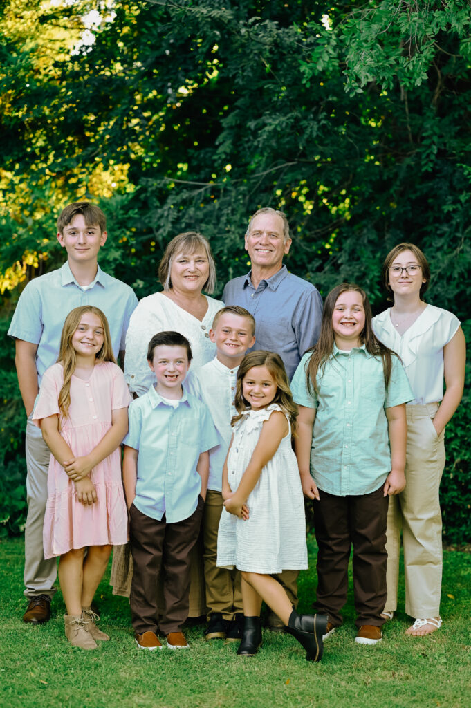 Grandma & Grandpa with their grandkids smiling on