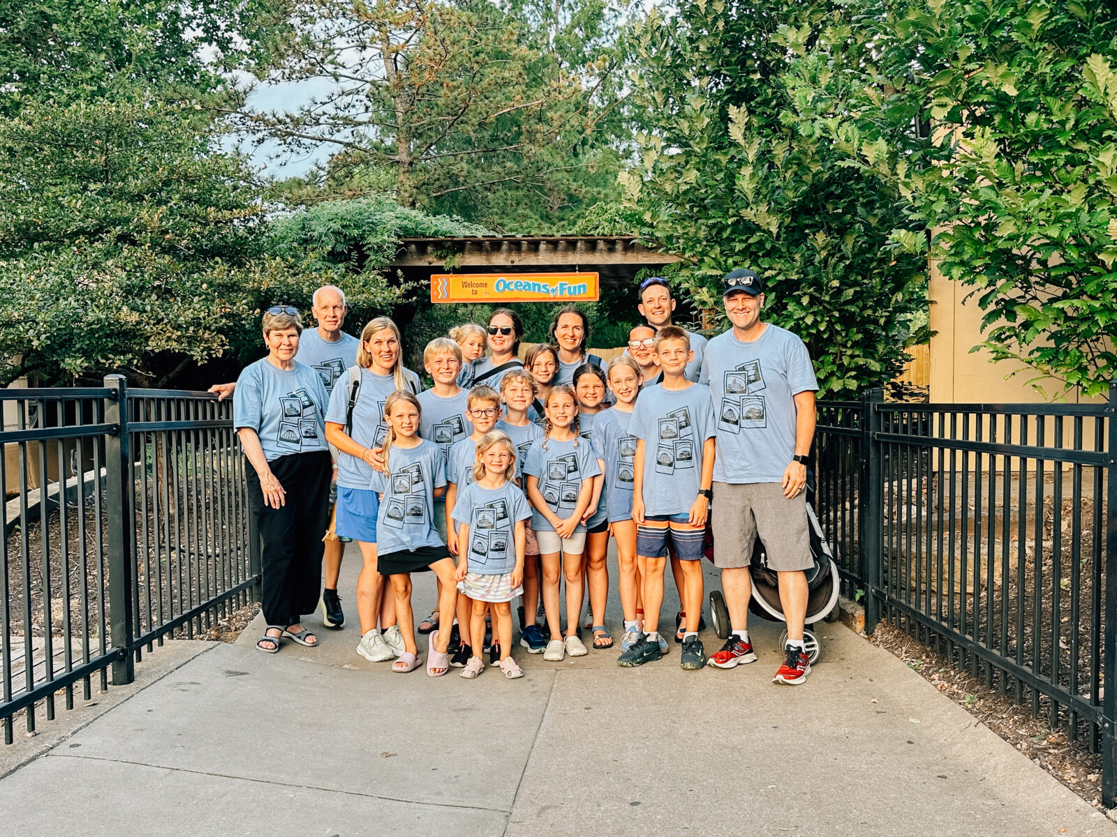 An extended family photo in front of Oceans of Fun when they leave the park.