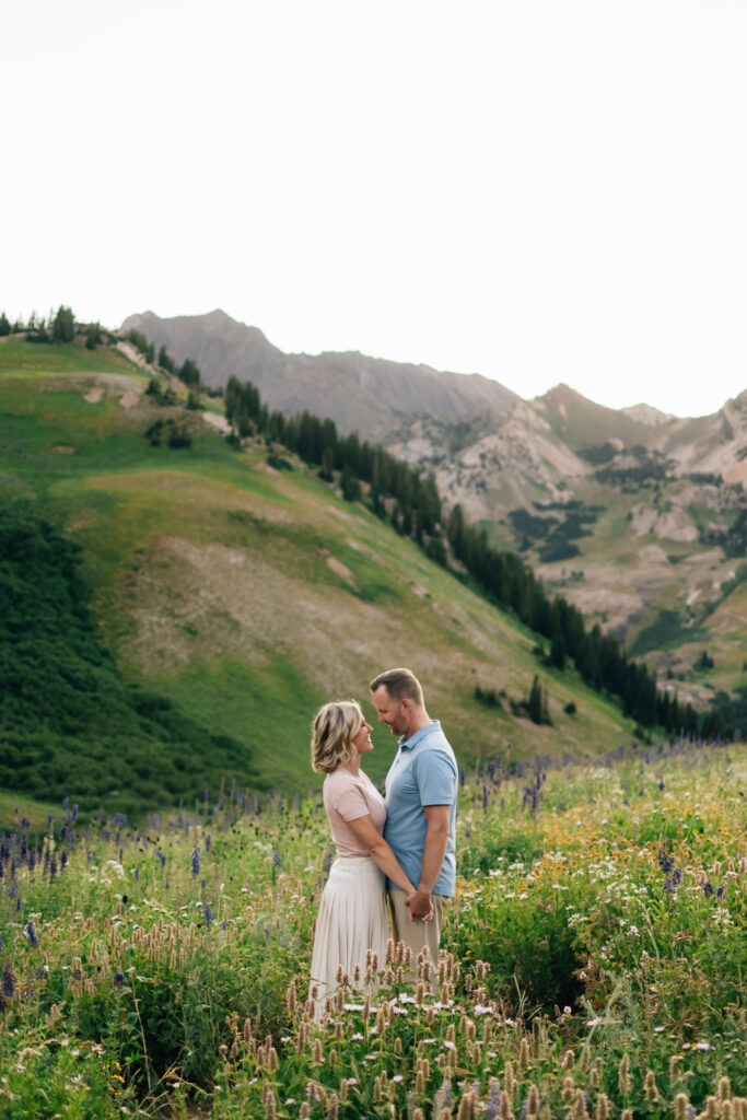 Parents sharing a quiet moment during their family session in the Utah mountains.