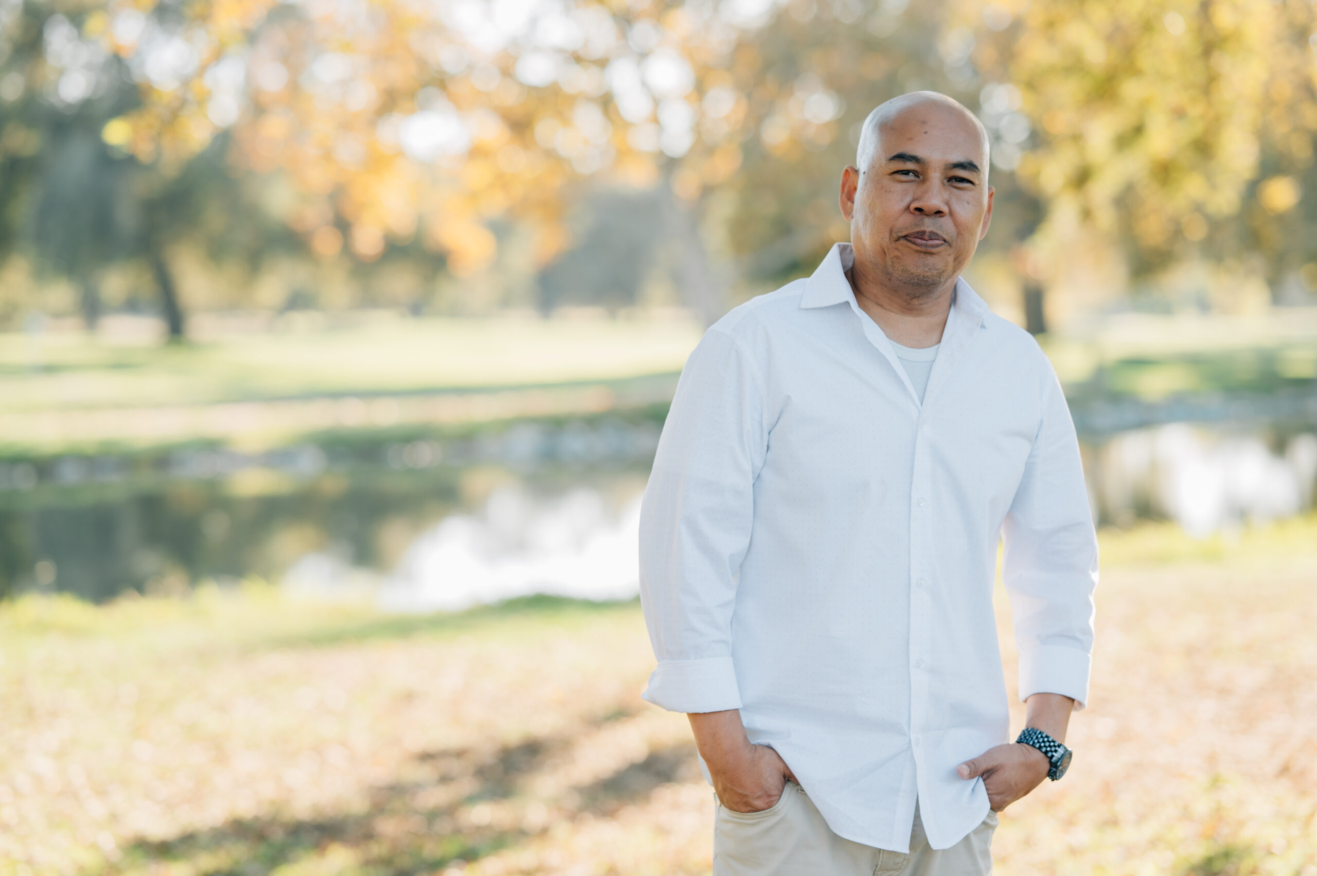A favorite Uncle posing by the lake at Oak Grove Park during a fall family photo session