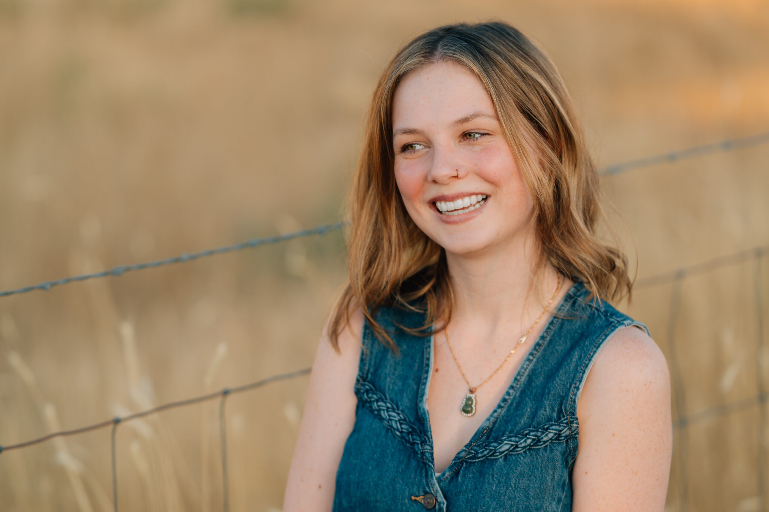 A bashful smile as this cute Senior preps for her pose.