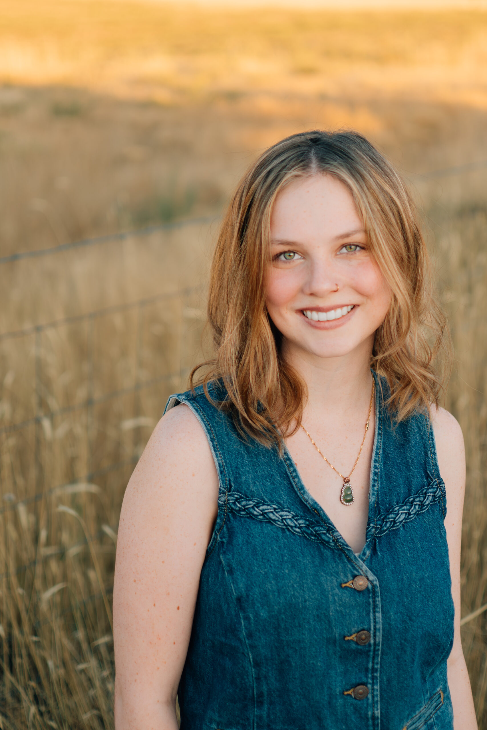 Close up of a smiling Senior portrait.