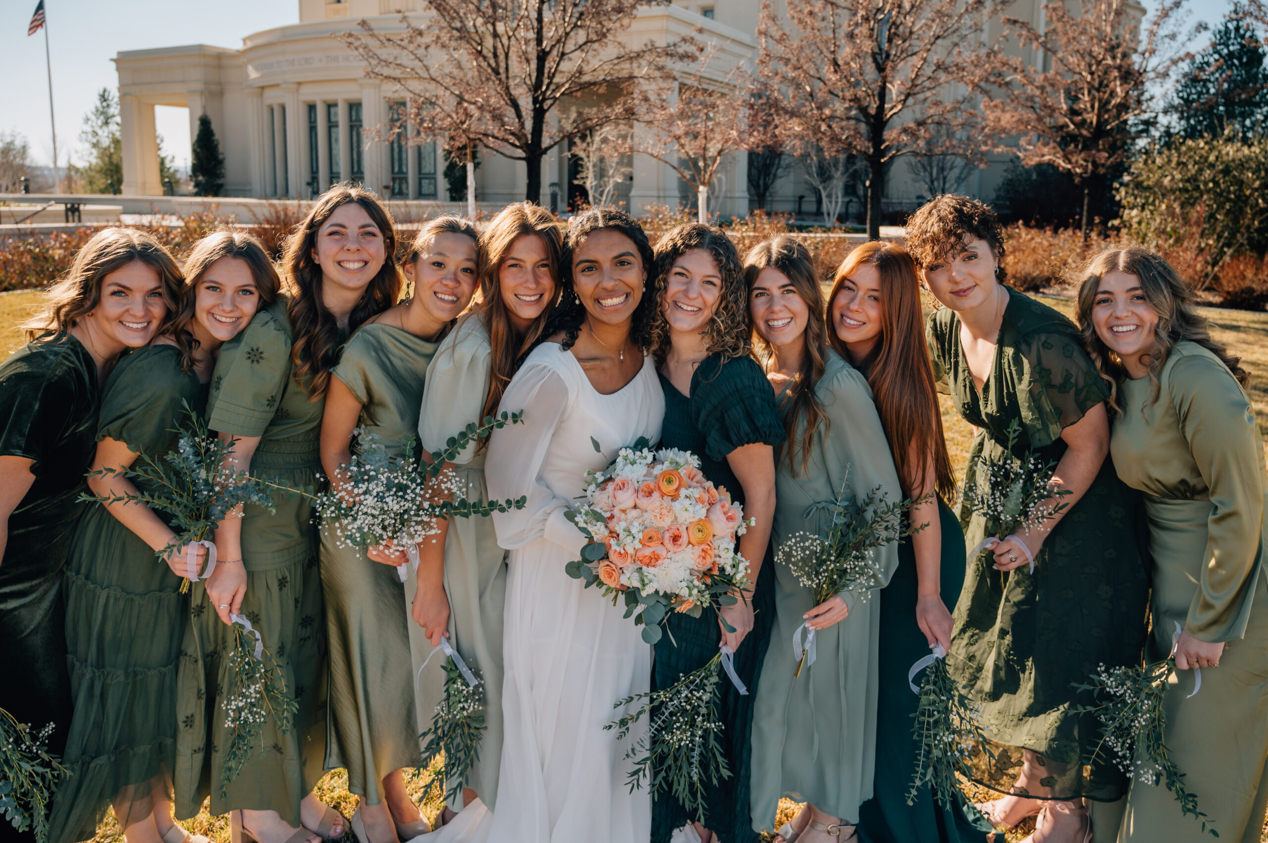 Bridesmaids gathered together outside the Payson Utah Temple