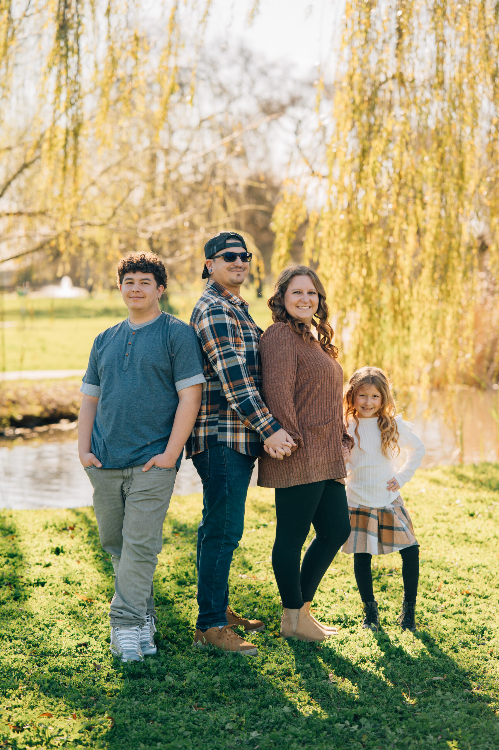 family portrait under willow tree at shumway oak grove park