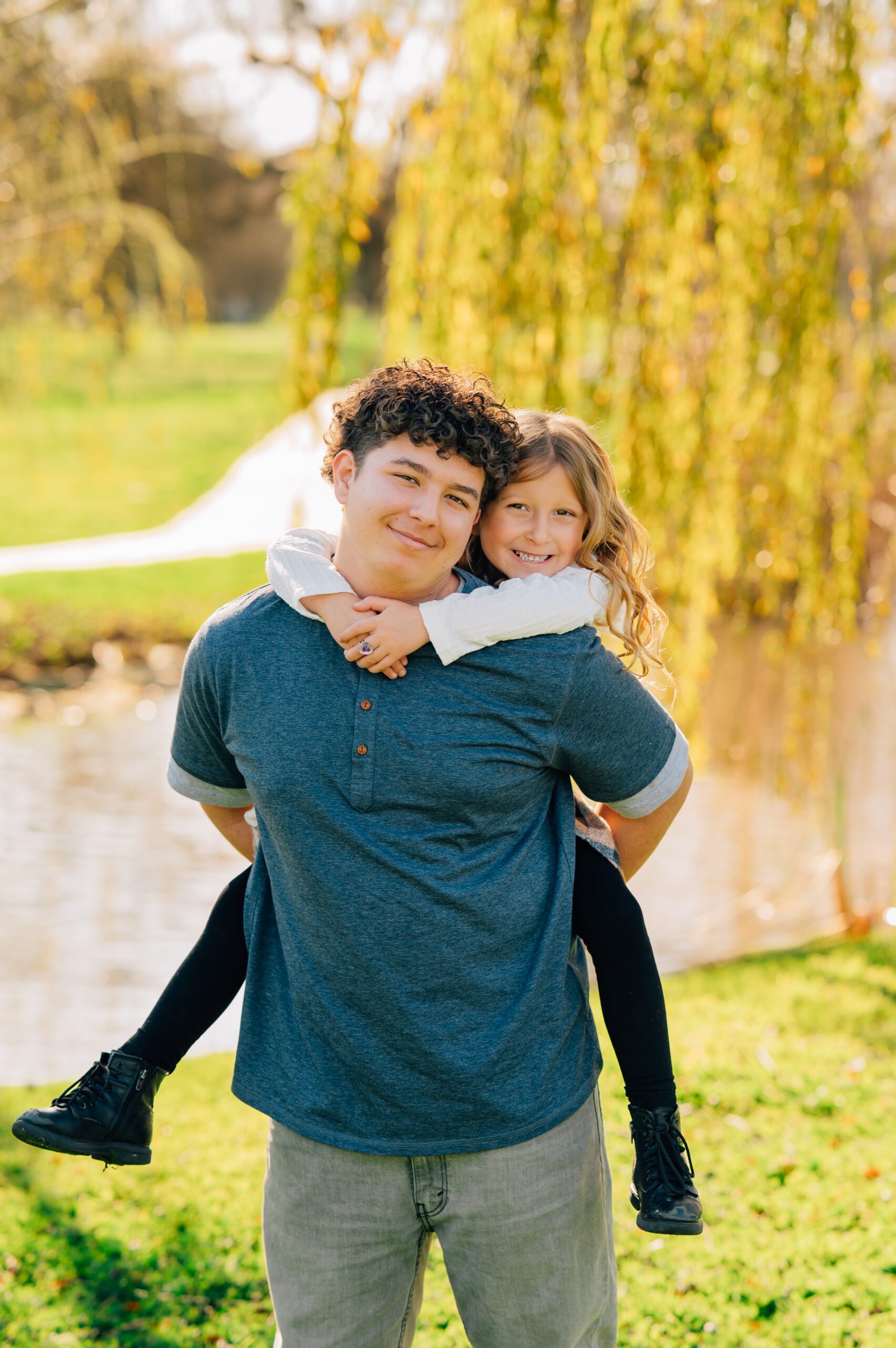 teenage boy and little girl sibling portrait at Shumway Oak Grove Park