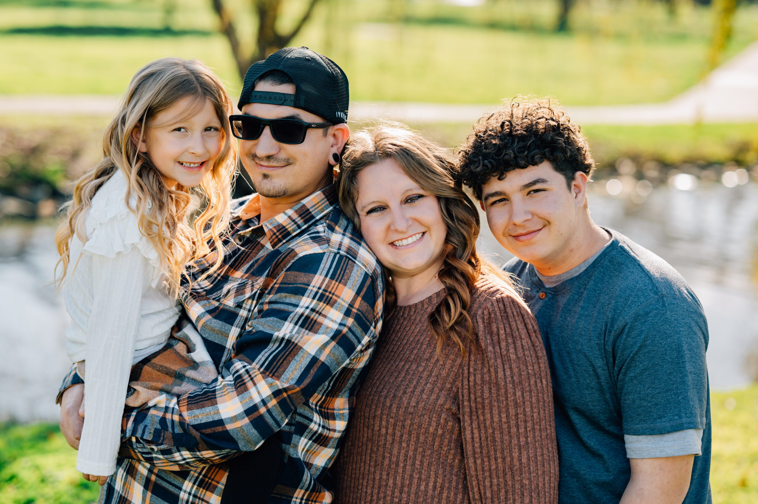 family portrait under willow tree at shumway oak grove park