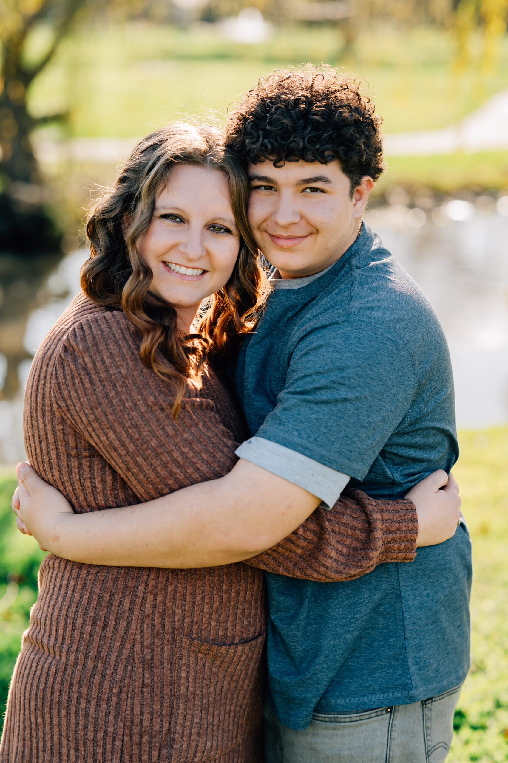 mother and son portrait in golden evening light