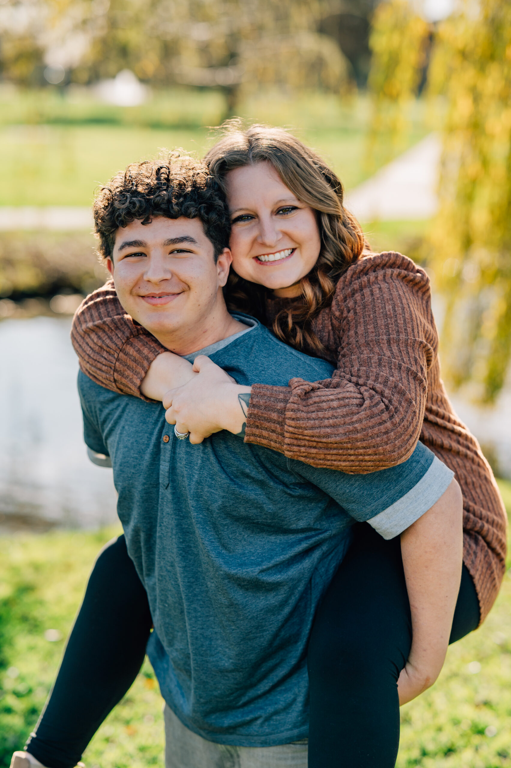 mother and son portrait in golden evening light