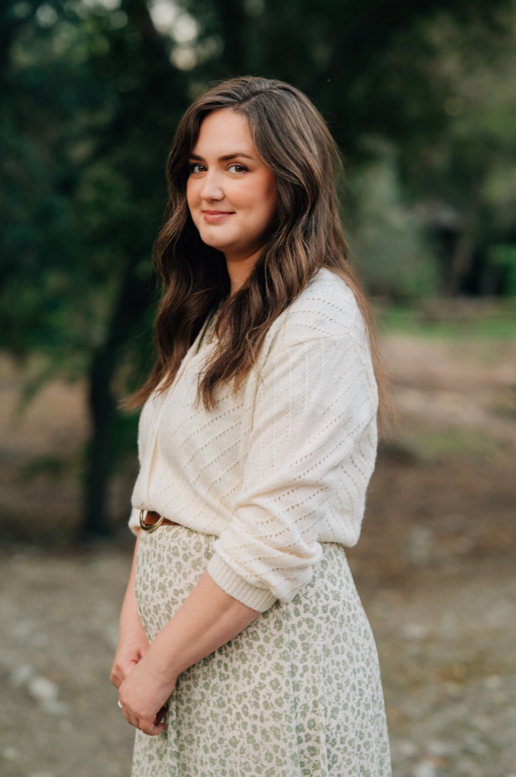 Close-up portrait of a gorgeous Momma during a playful outdoor family session