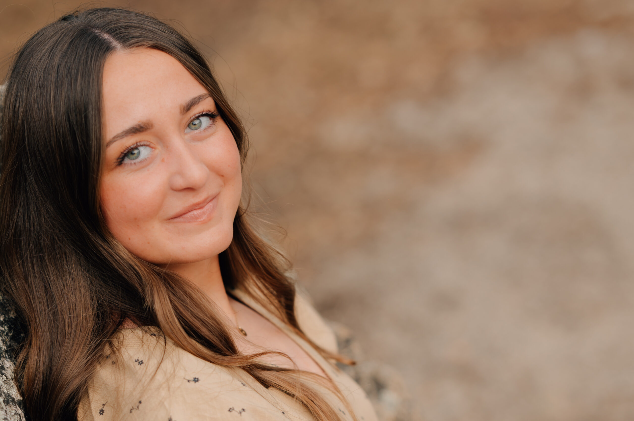 Close-up senior portrait with blue eyes and soft natural light in Rocklin